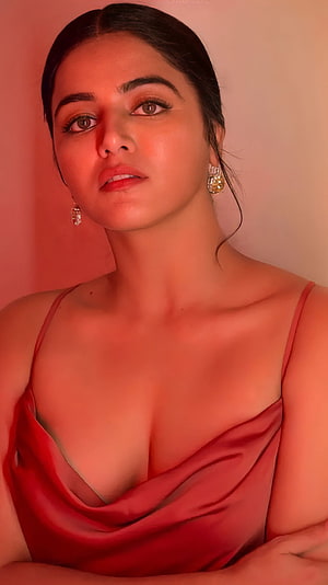 Wamiqa Gabbi in a Red Satin Dress with Warm Cinematic Lighting HD phone wallpaper