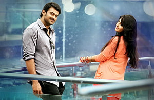 Prabhas and Anushka Shetty in a romantic scene from the film Mirchi HD wallpaper