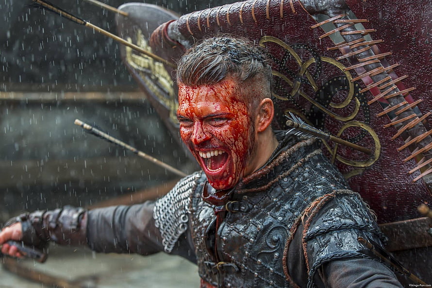 Ivar the Boneless Viking Warrior in Rainy Battle Scene with Shield and Blood HD wallpaper