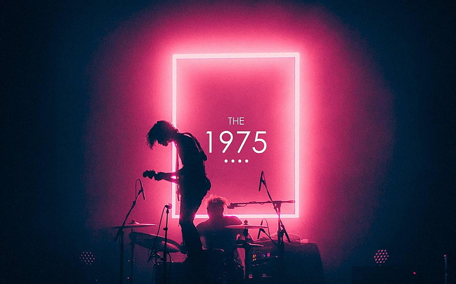 The 1975 Live Concert Stage with Neon Pink Backdrop and Silhouetted Guitarist HD wallpaper