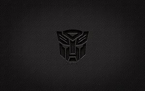 Transformers Autobot Emblem on Dark Carbon Fiber Texture HD wallpaper