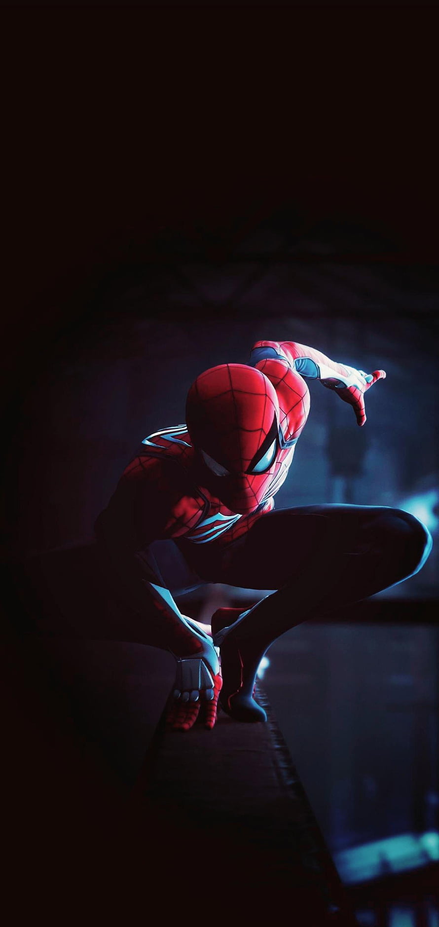 Spider-Man in a Crouched Action Pose with Dramatic Blue Lighting HD phone wallpaper