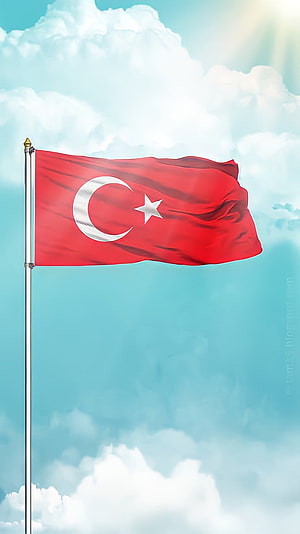 Turkish National Flag Waving Against a Bright Blue Sky with Fluffy White Clouds HD phone wallpaper