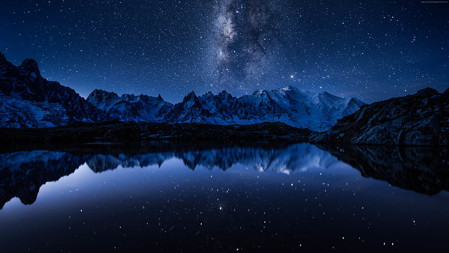Milky Way Galaxy Over Snow-Capped Mountain Range Reflected in a Still Alpine Lake at Night HD wallpaper