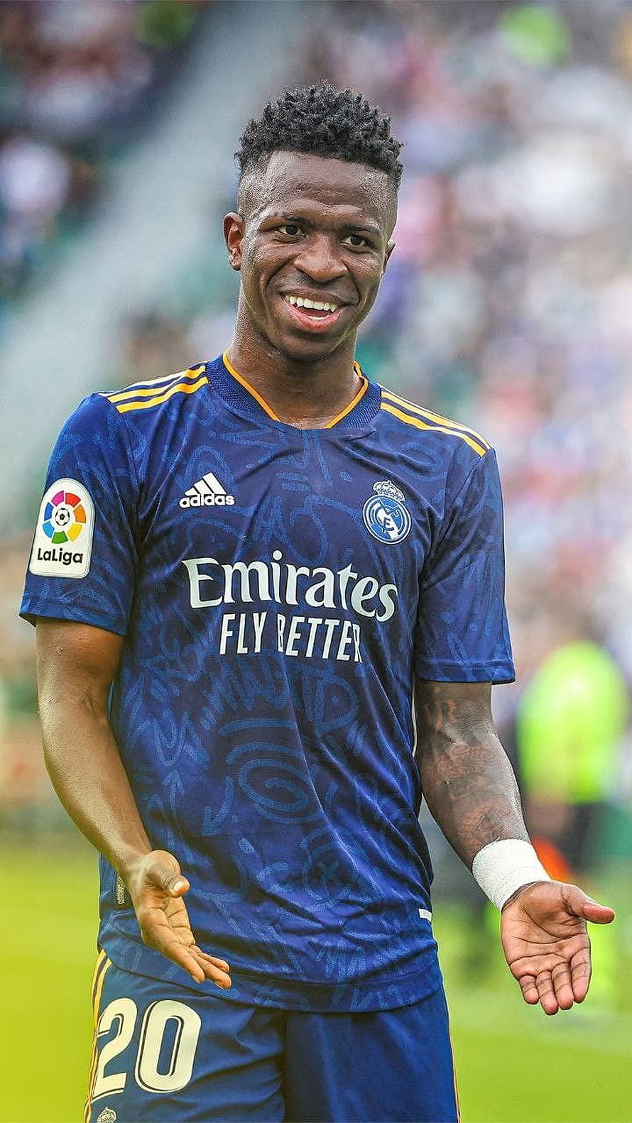 Vinicius Jr in Real Madrid Away Kit Smiling on the Pitch HD phone wallpaper