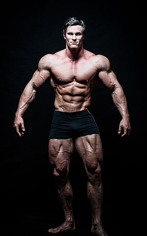 Calum von Moger Bodybuilding Pose on Black Background HD phone wallpaper