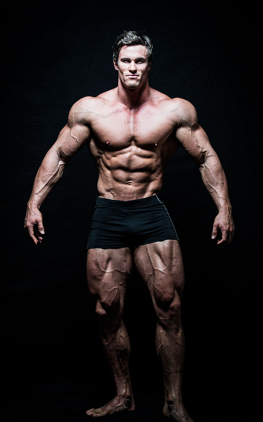 Calum von Moger Bodybuilding Pose on Black Background HD phone wallpaper
