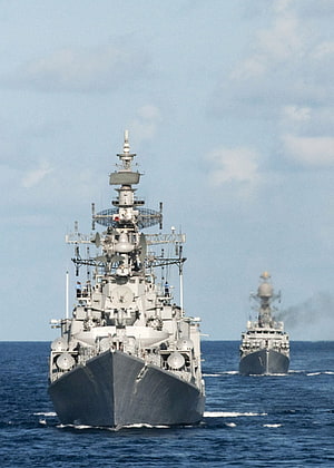 Indian Navy warships sailing in formation across open ocean waters HD phone wallpaper