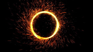 Doctor Strange Magic Portal with Golden Energy Ring and Radiant Sparks on Black Background HD wallpaper
