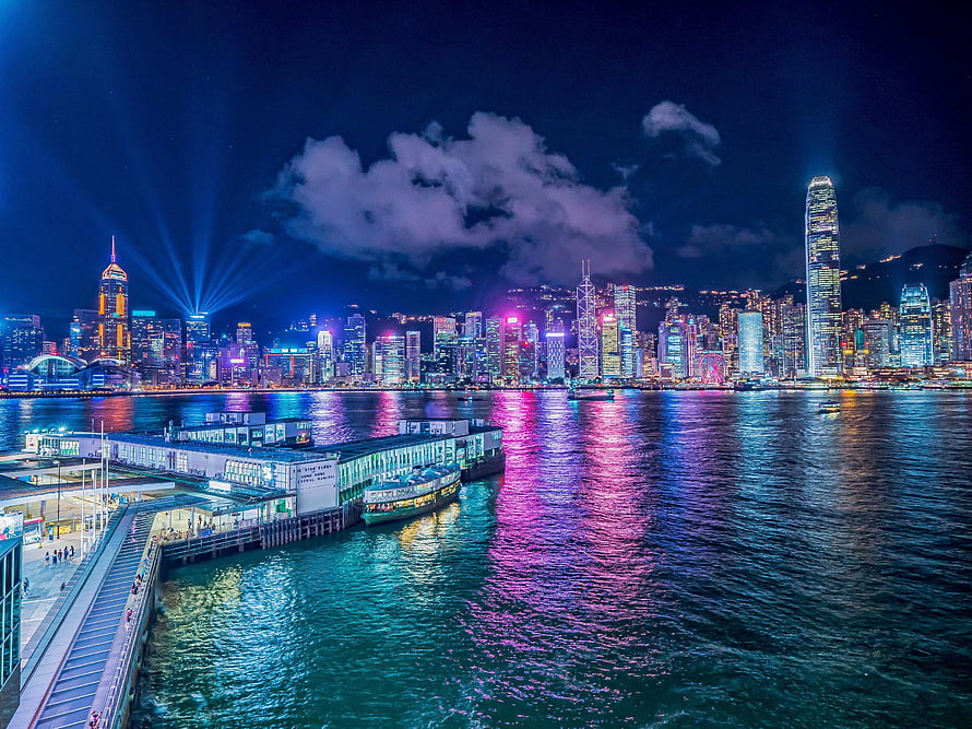 Hong Kong Victoria Harbour Night Skyline with Colorful City Lights and Water Reflections HD wallpaper