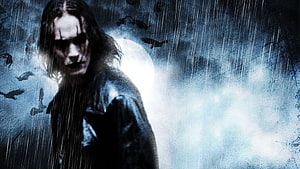 The Crow Movie Poster Featuring Dark Figure in Rain and Moonlight HD wallpaper