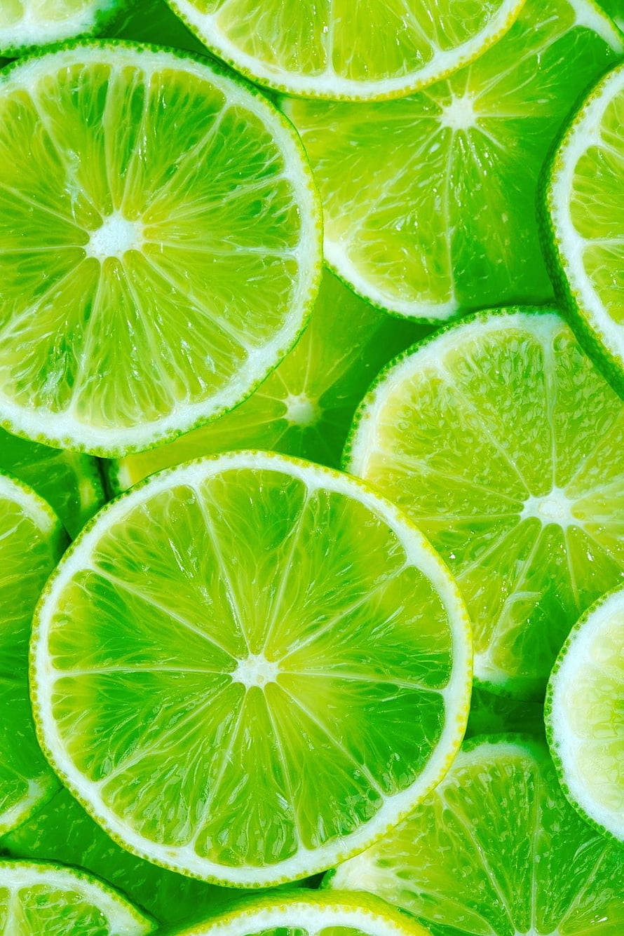 Vibrant Green Lime Slices Patterned Background With Fresh Citrus Texture HD phone wallpaper