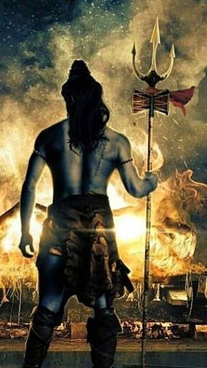 Shiva Silhouette Holding Trishul Against Dramatic Fiery Sky HD phone wallpaper