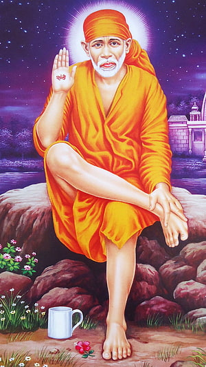Sai Baba Portrait in Orange Robes Seated on Rocks Under Starry Night Sky HD phone wallpaper