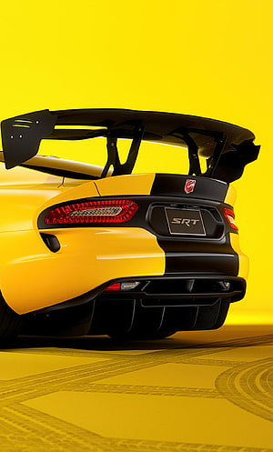 Dodge Viper ACR Rear View with Carbon Fiber Wing and SRT Badge on Yellow Background HD phone wallpaper