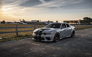 2021 Dodge Charger Hellcat Gray Sedan with Black Racing Stripes at Sunset HD wallpaper