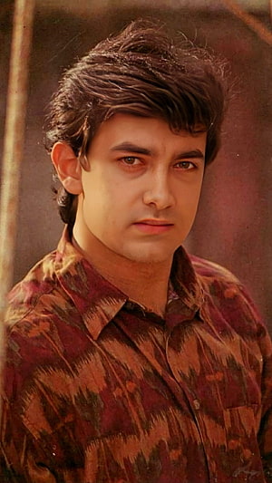Aamir Khan Portrait in Patterned Shirt with Warm Vintage Film Tone HD phone wallpaper