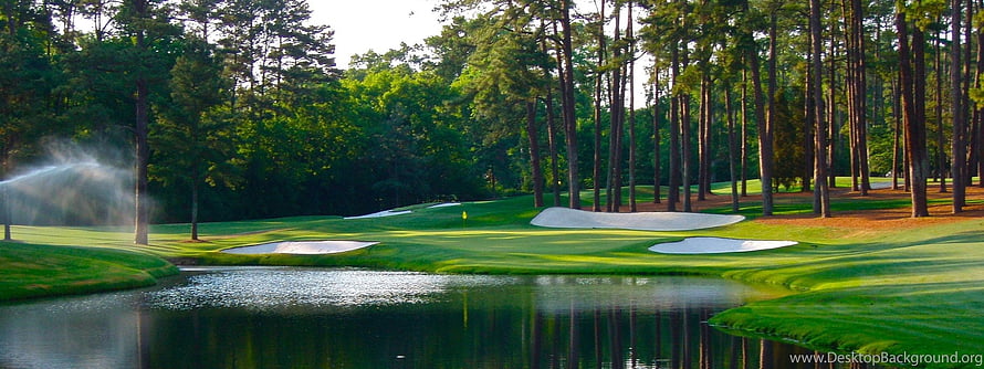Serene Golf Course Landscape With Water Hazard And Sprinklers HD wallpaper