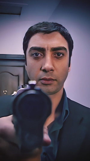 Polat Alemdar Holding Pistol in Dark Suit HD phone wallpaper