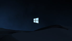 Windows 10 Dark Minimalist Landscape with Glowing Logo on Rolling Hills HD wallpaper