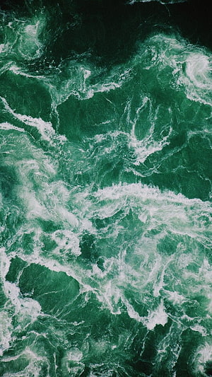 Aerial View of Turquoise Ocean Waves with White Sea Foam and Deep Green Water HD phone wallpaper