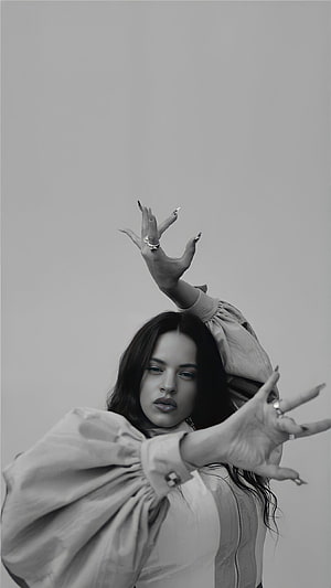 Rosalía Black and White Portrait with Dramatic Hand Gestures and Puffed Sleeves HD phone wallpaper