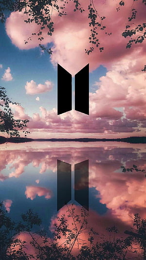 BTS Logo Over Pink Cloudy Lake Reflection With Silhouetted Tree Branches HD phone wallpaper
