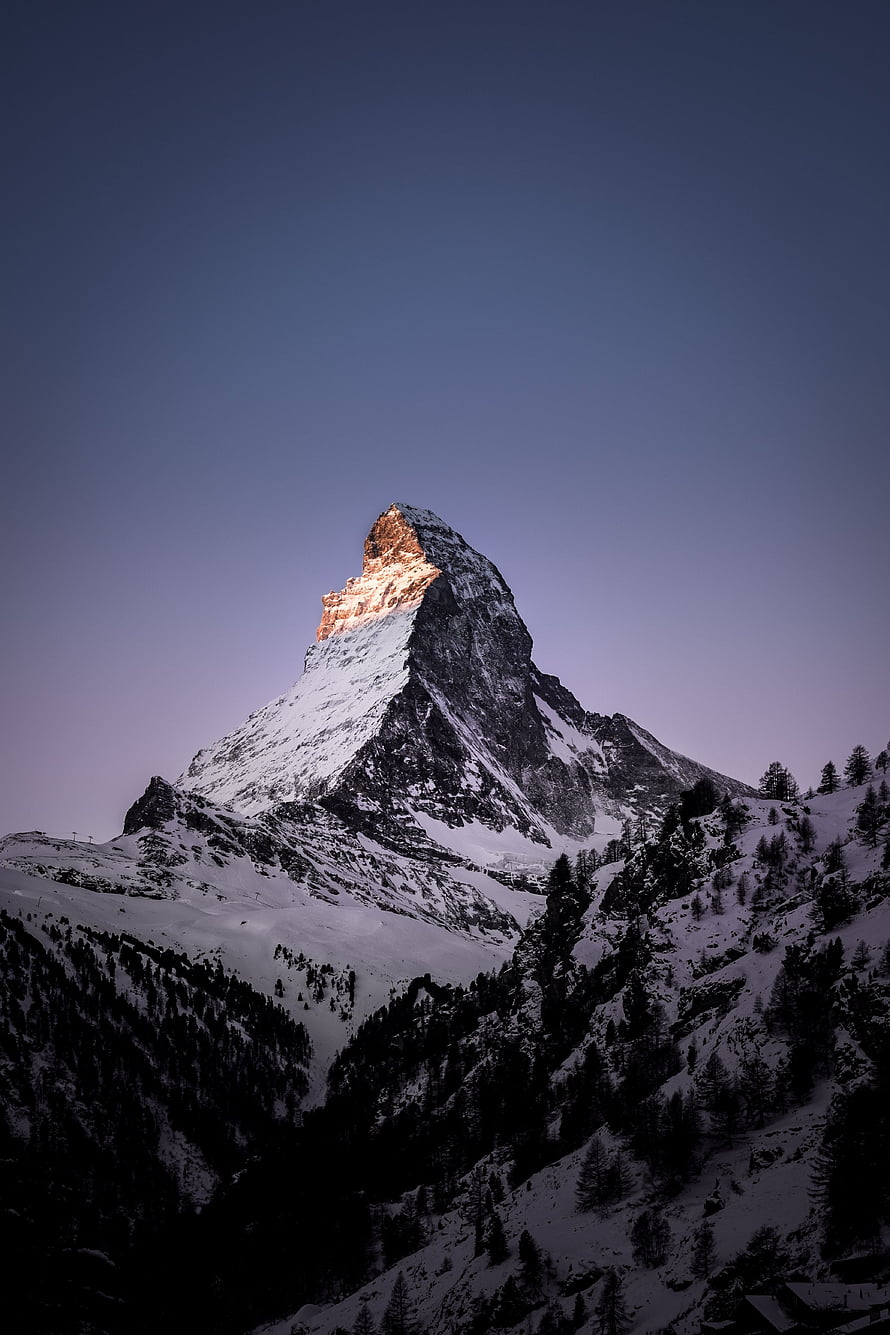 Matterhorn Peak at Dawn with Snow-Capped Summit and Alpine Forest HD phone wallpaper