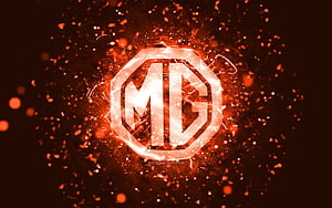 Glowing MG Octagonal Logo with Fiery Orange Sparks and Neon Energy Burst HD wallpaper