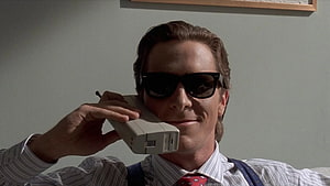 Patrick Bateman in American Psycho Holding a Vintage Brick Phone, Patrick Bateman HD wallpaper