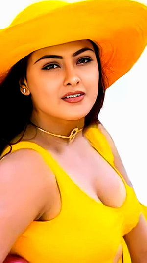 Simran Baga Portrait in Vibrant Yellow Dress and Wide-Brimmed Sun Hat HD phone wallpaper