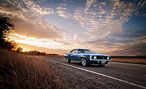 1969 Chevrolet Camaro SS Classic Muscle Car on a Country Road at Sunset HD wallpaper