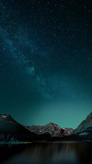 Milky Way Galaxy Arching Over Mountain Peaks and Lake at Night HD phone wallpaper