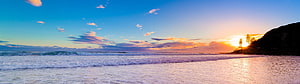 Panoramic Beach Sunset with Gentle Waves and Distant Headland HD wallpaper