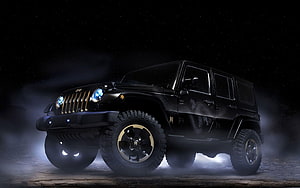 Black Jeep Wrangler with Gold Accents in Dramatic Night Lighting HD wallpaper