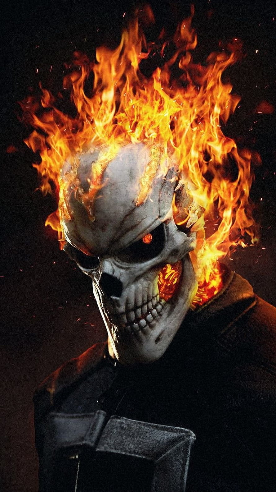 Ghost Rider Burning Skull with Fiery Flames and Glowing Red Eyes in Dark Cinematic Style HD phone wallpaper