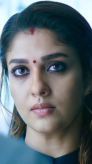 Nayantara Close-Up Portrait with Red Bindis and Intense Gaze HD phone wallpaper