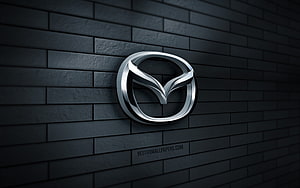 Mazda 3D Chrome Emblem on Dark Gray Brick Wall HD wallpaper