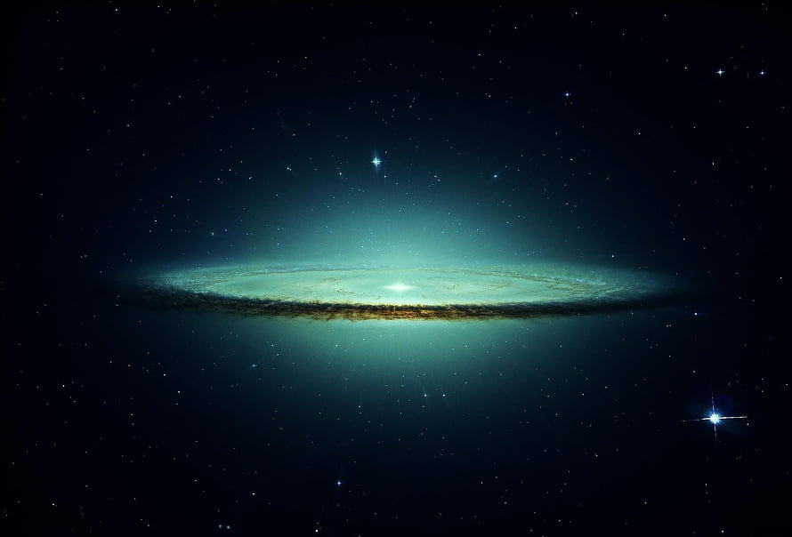 Edge-On Spiral Galaxy with Luminous Core and Dust Lane in Deep Space HD wallpaper
