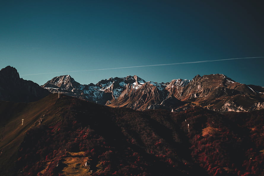 Asturias Mountain Range with Snow-Capped Peaks and Autumn Foliage in Spain HD wallpaper