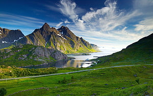 Norwegian Fjord Landscape with Green Hills and Mountain Peaks HD wallpaper