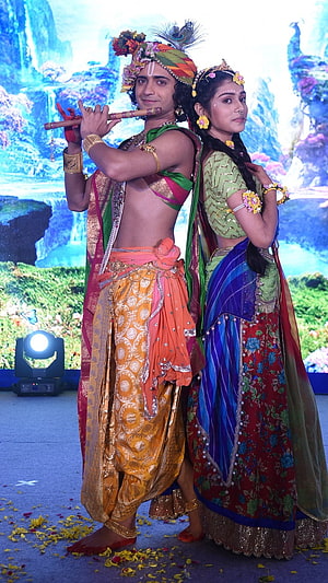 Radha Krishna Devotional Stage Performance in Traditional Indian Attire HD phone wallpaper