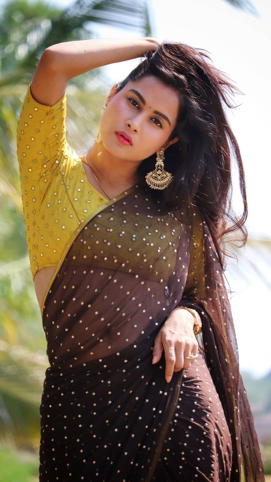 Kanchan Bamne in a Brown Saree with Yellow Blouse and Traditional Gold Earrings HD phone wallpaper