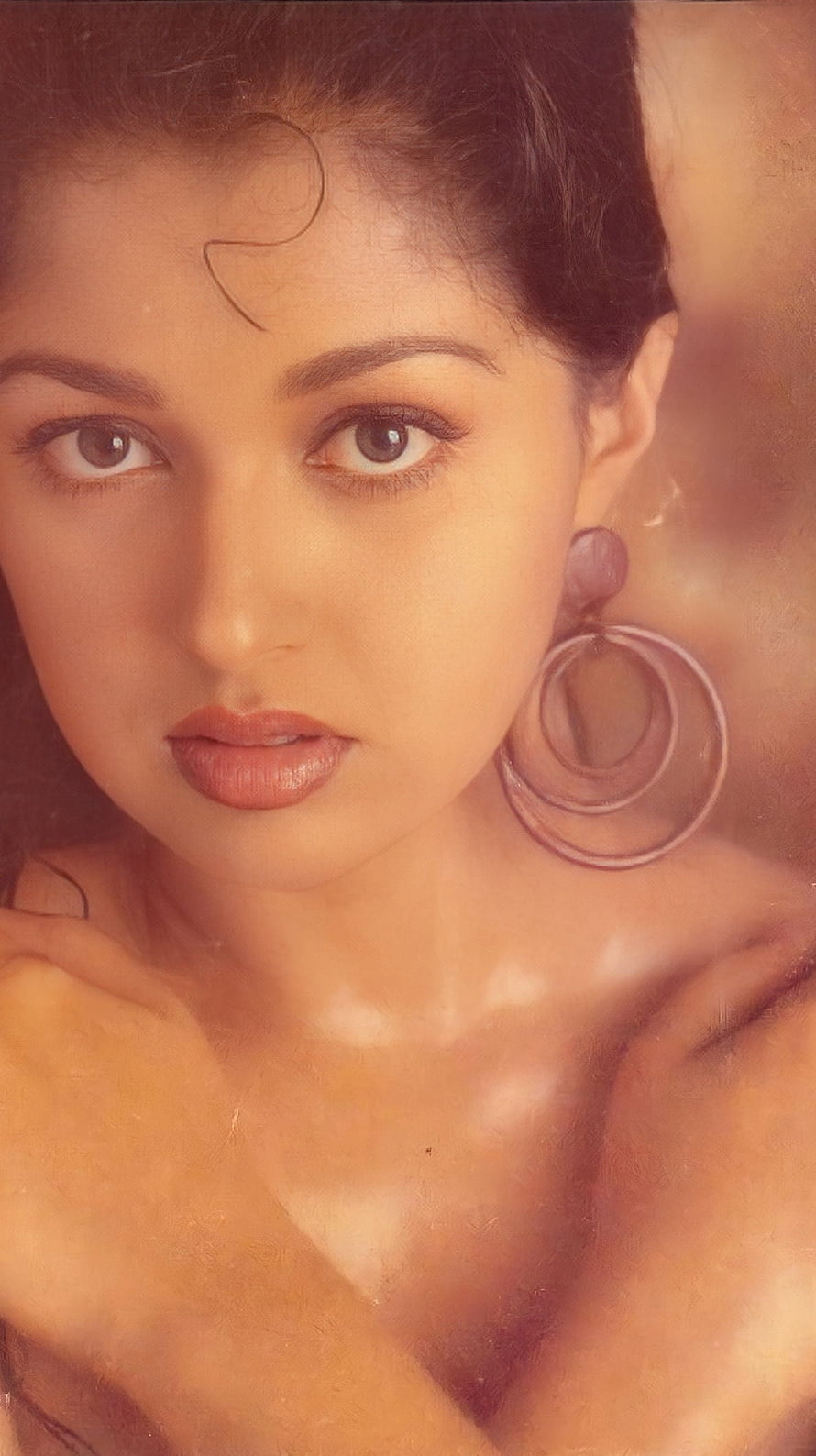 Goutami Tamil Actress Portrait with Large Hoop Earrings and Warm Sepia Tones HD phone wallpaper