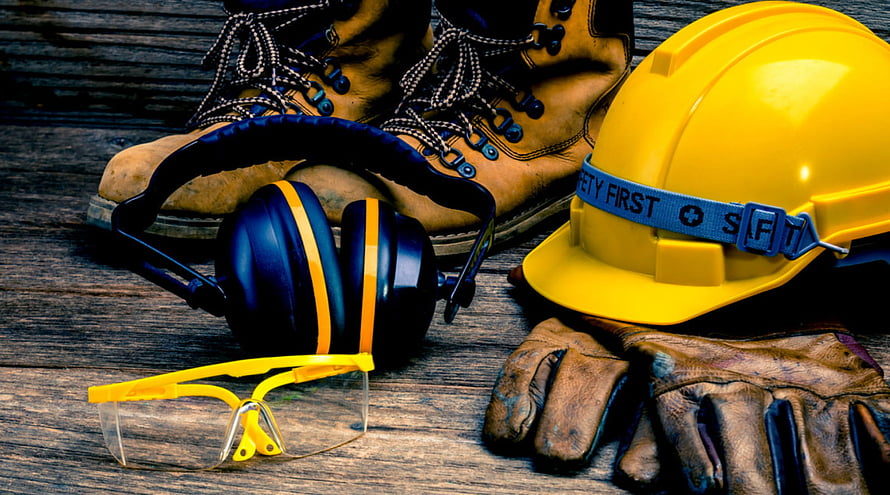 Construction Safety Gear Arrangement with Hard Hat, Boots, and Protective Equipment HD wallpaper