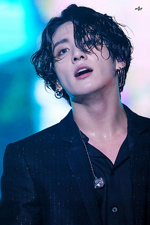 BTS Jungkook Stage Portrait With Long Wavy Hair And Black Suit HD phone wallpaper