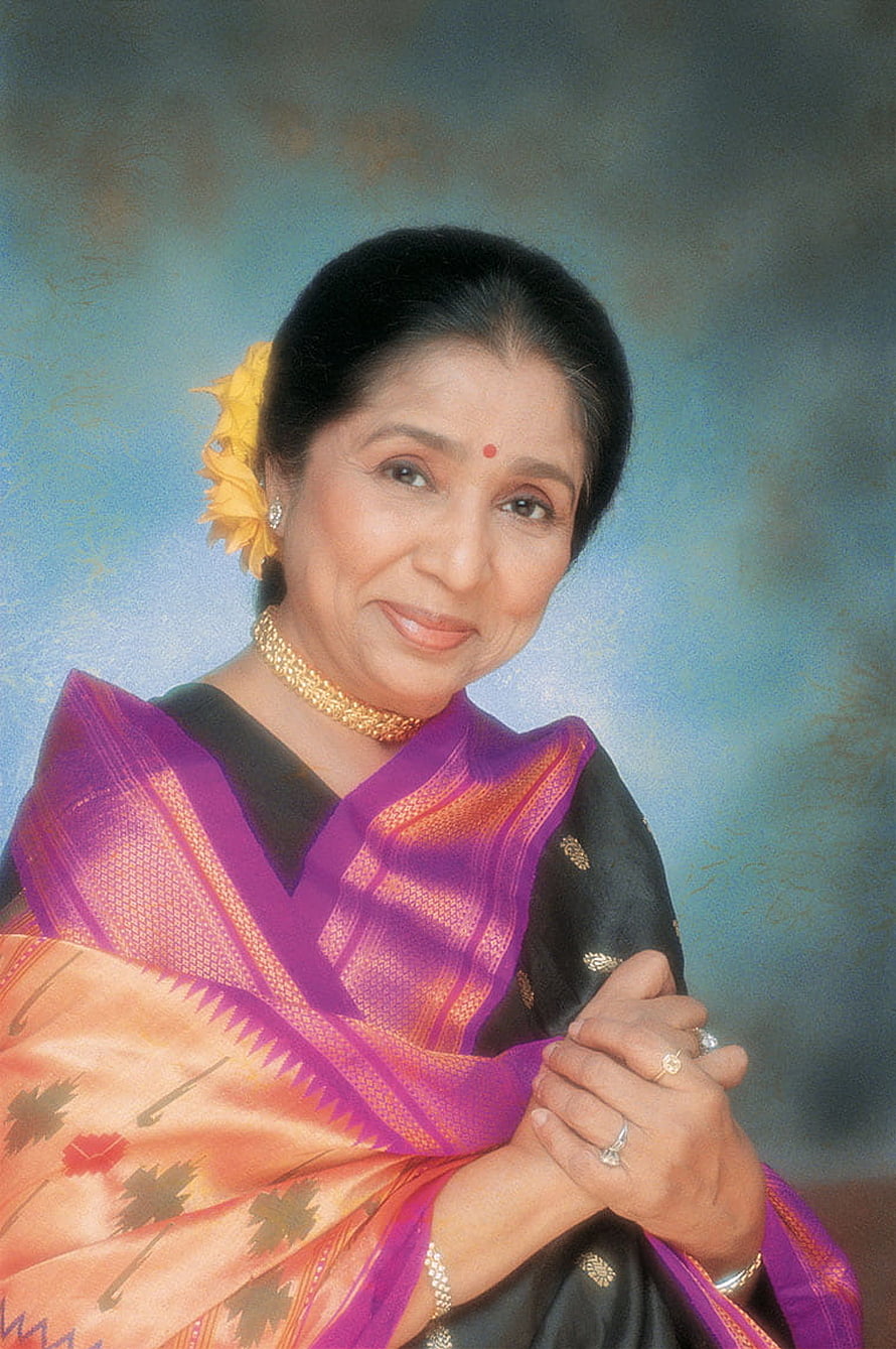 Asha Bhosle Portrait in Purple and Gold Silk Saree with Floral Hairpiece HD phone wallpaper