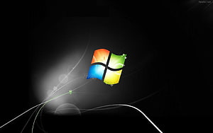 Windows 7 Logo on Dark Background with Abstract Light Streaks and Green Accents HD wallpaper