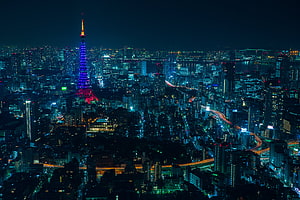 Tokyo Skyline at Night Featuring the Illuminated Tokyo Tower and City Lights HD wallpaper