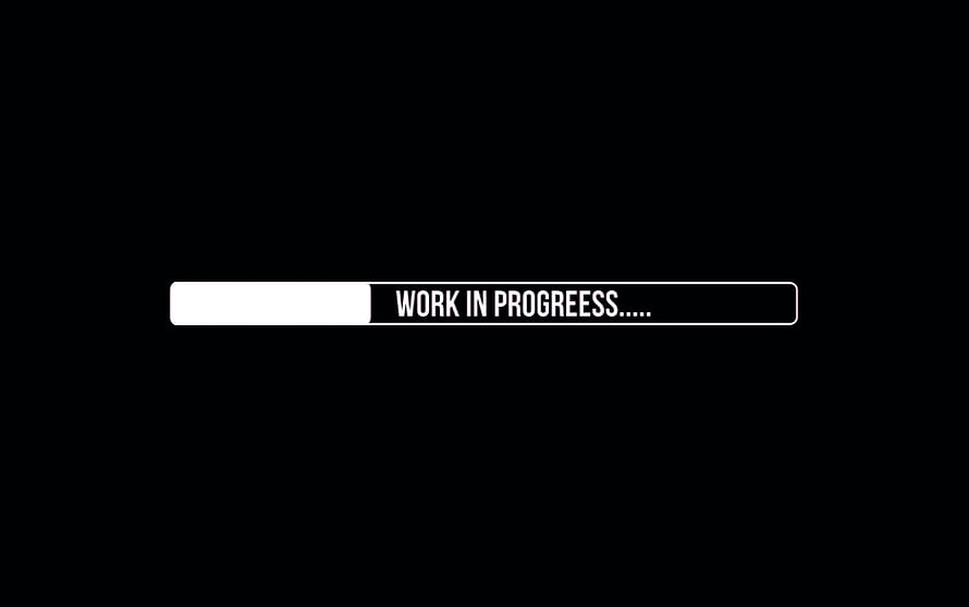 Minimalist Black Background with White Progress Bar and Work in Progress Text HD wallpaper